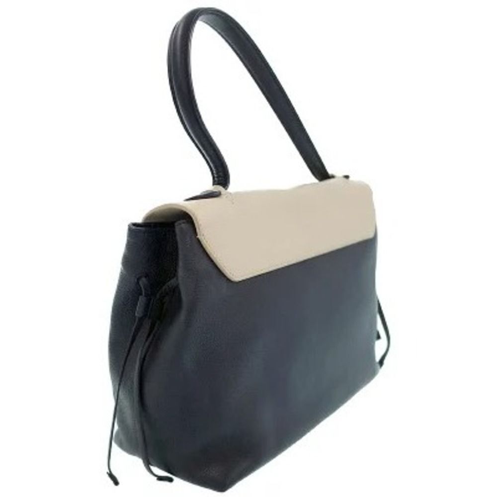 Louis Vuitton Lock Me MM Handbag - Picture 5 of 9